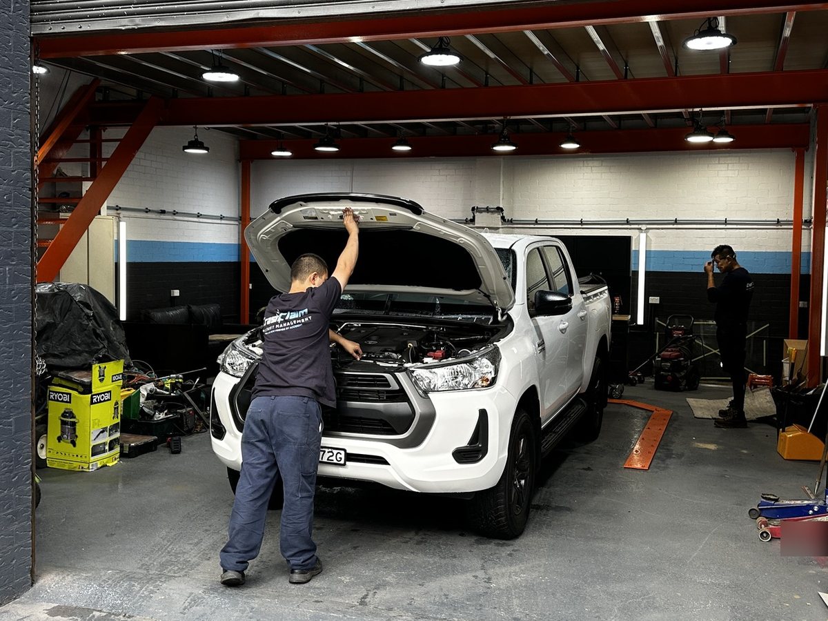 CrashClaim NSW repairer working on a vehicle